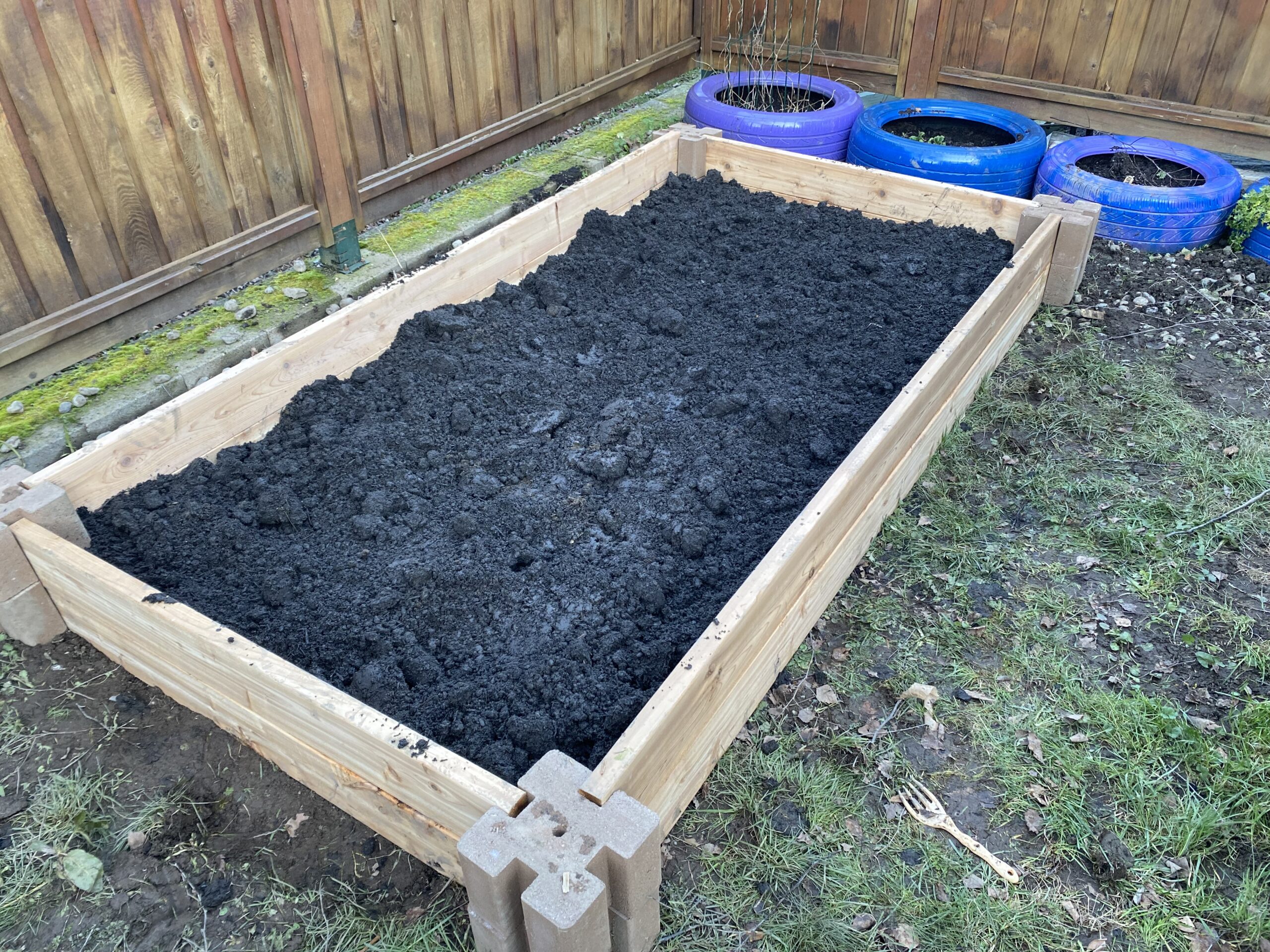 Raised garden bed with soil